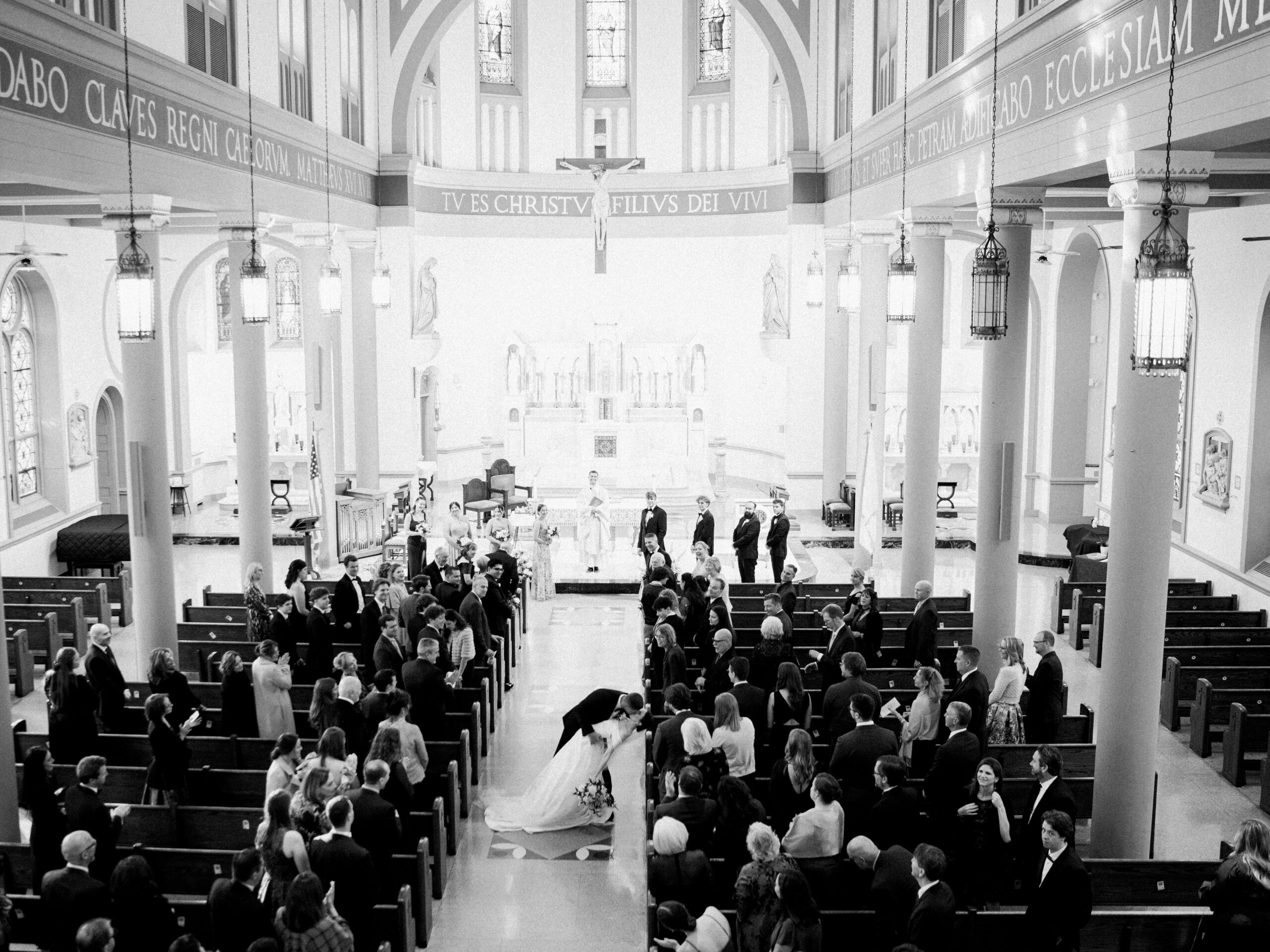 Photo of a bride and groom at their ceremony for a wedding at the Willard Intercontinental Hotel by K Bella Events